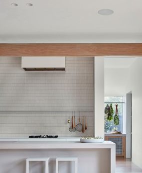 Central Park Road white kitchen with timber beam across the ceiling